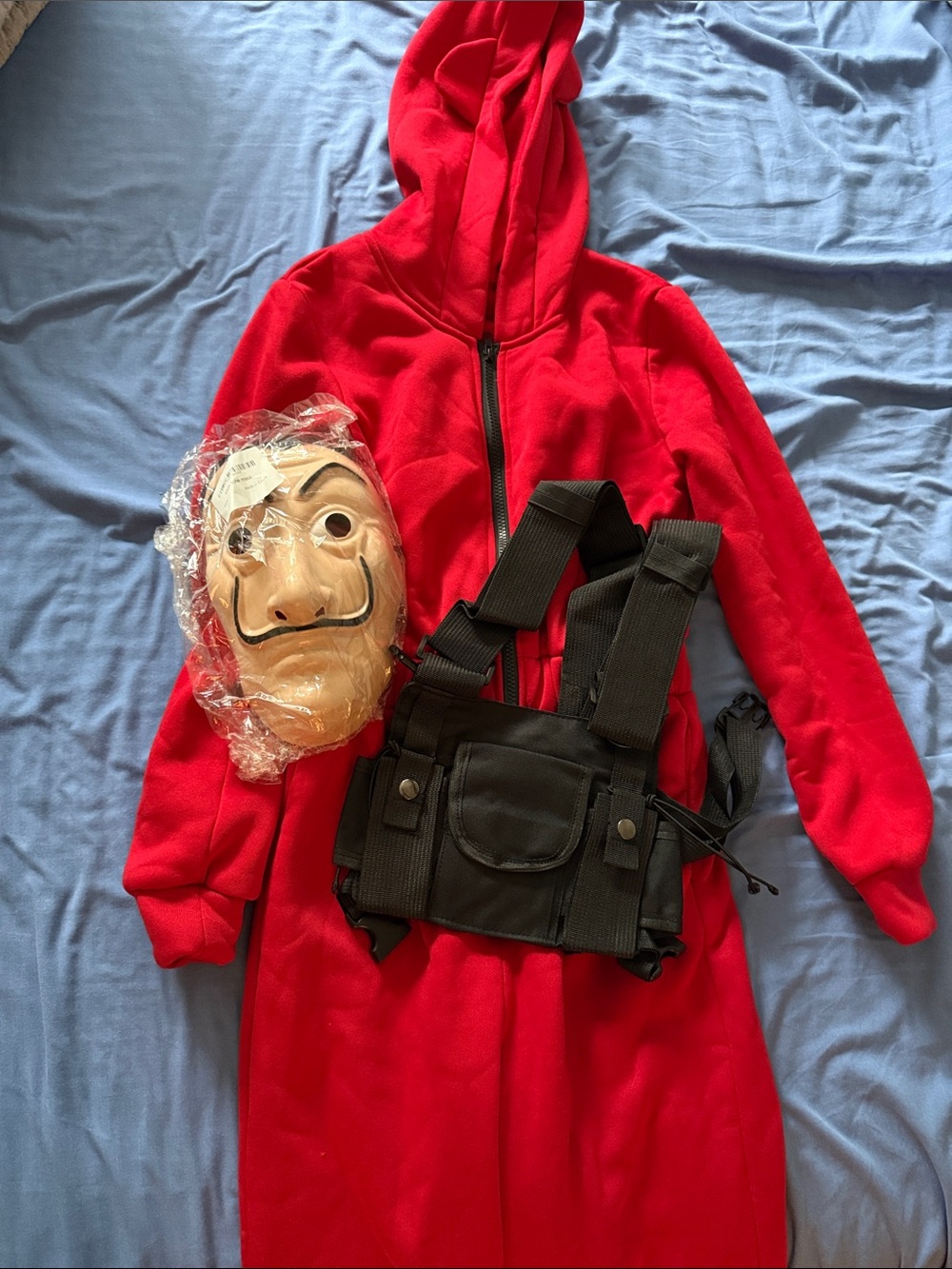 Red Hooded Jumpsuit with Black Tactical Chest Rig and Mask